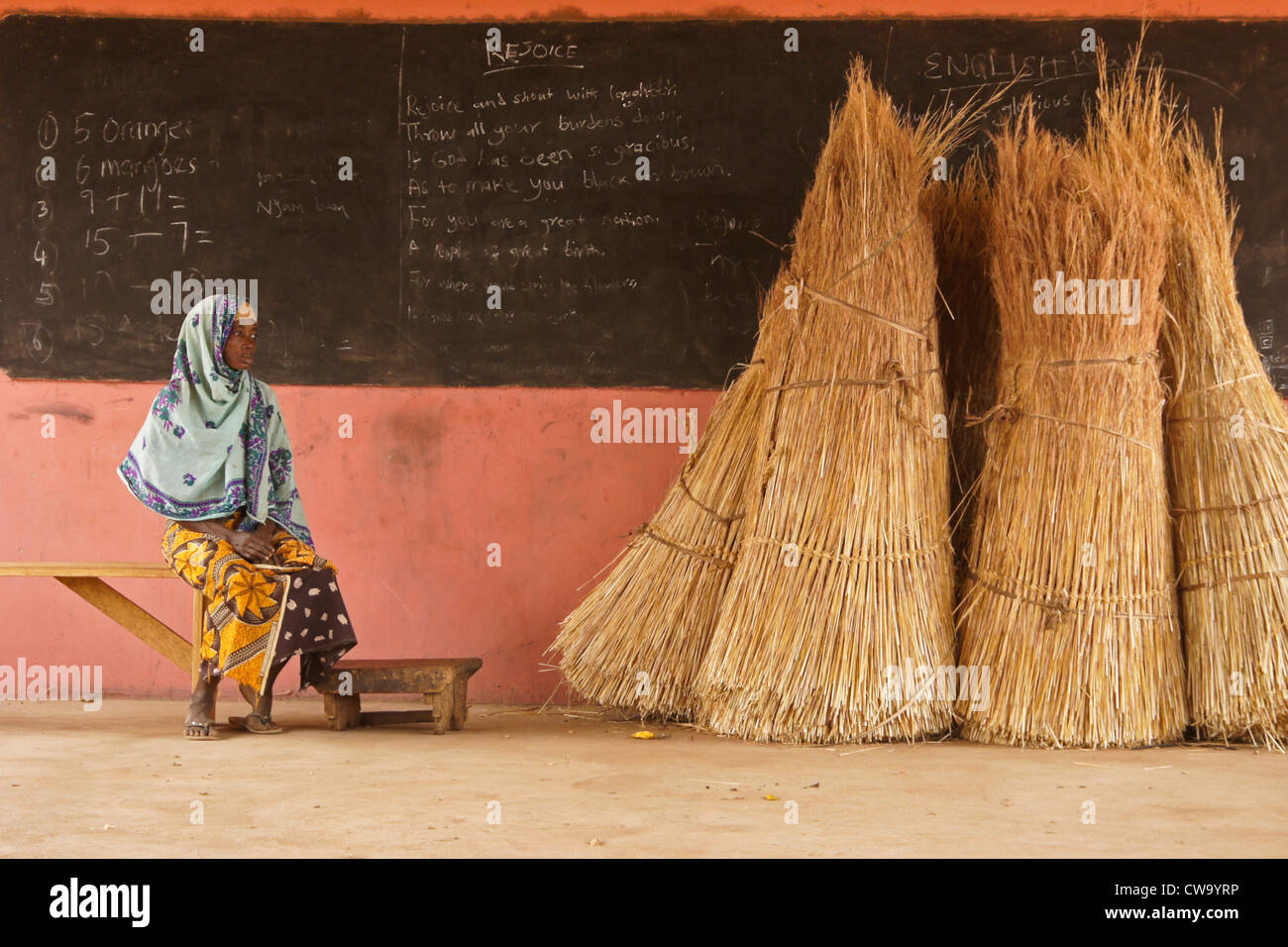 Woman sitting in school classroom, Gambaga, Ghana Stock Photo