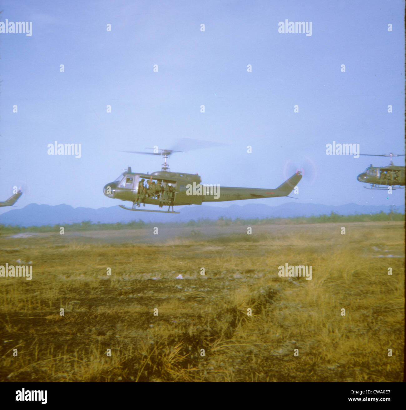 A Company, 227th AHC lift Cavalry Huey Helicopter inserting troops assault American Soldiers GIs US Army United States Military Stock Photo