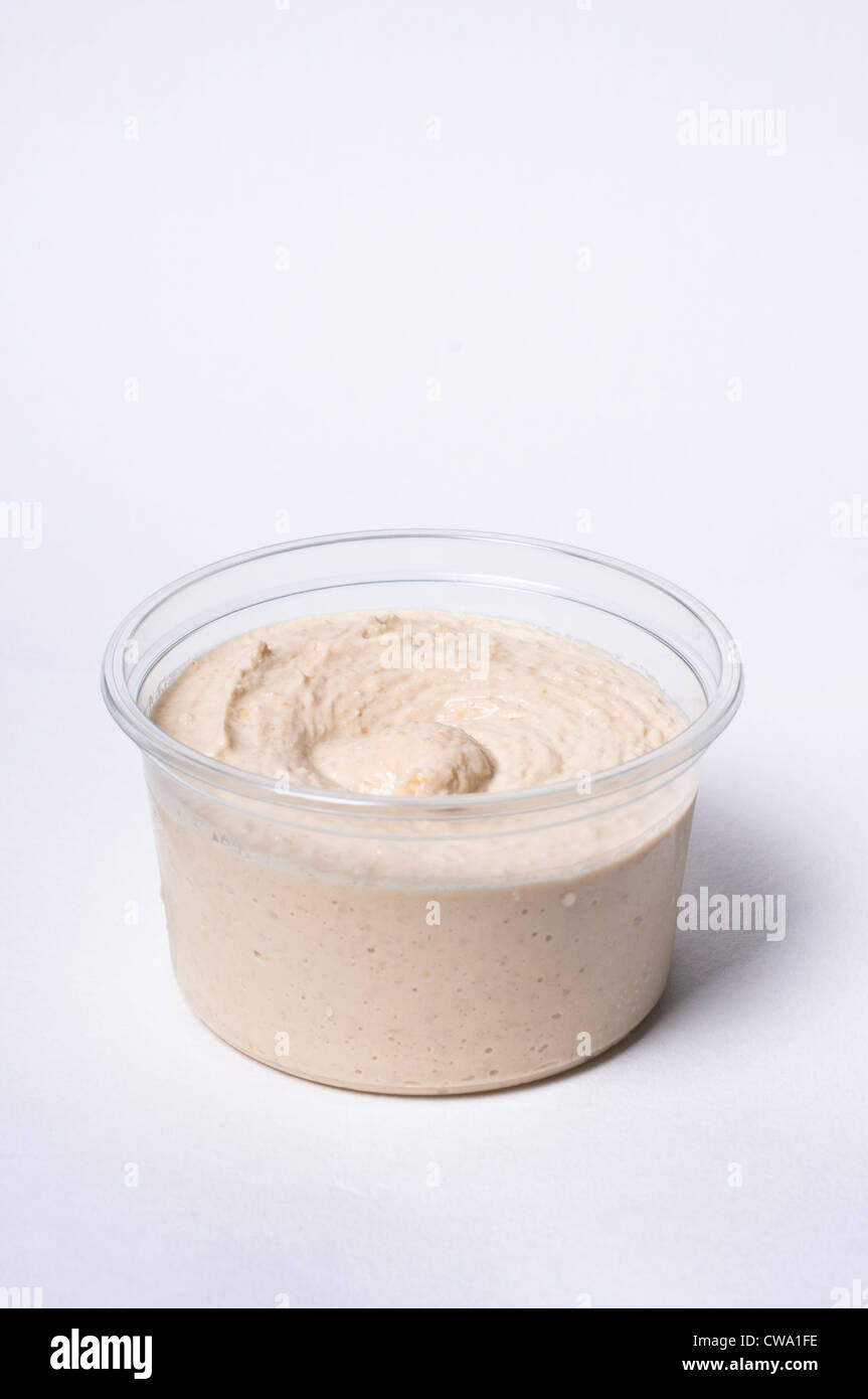 Tub of humus Stock Photo