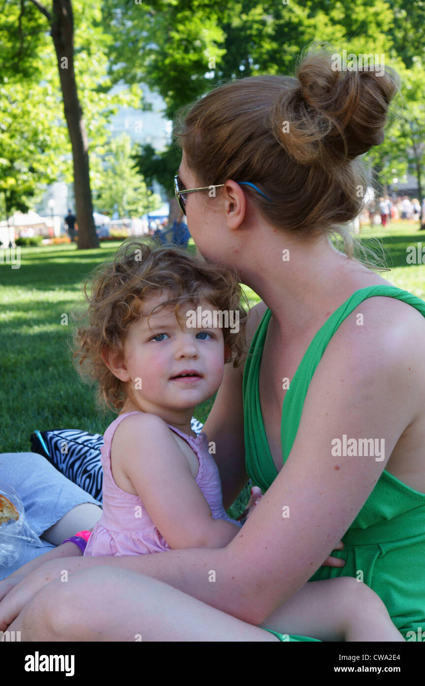 baby girl female child kid mother affection love calm nature candid portrait headshot madison wisconsin wi Stock Photo