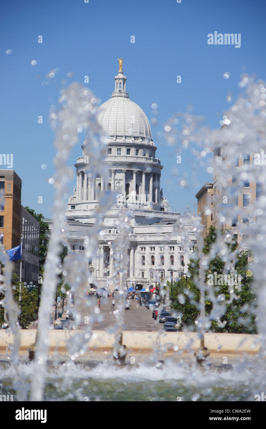 capitol seen through fountain water madison wisconsin wi governement seat high speed capital of government Stock Photo