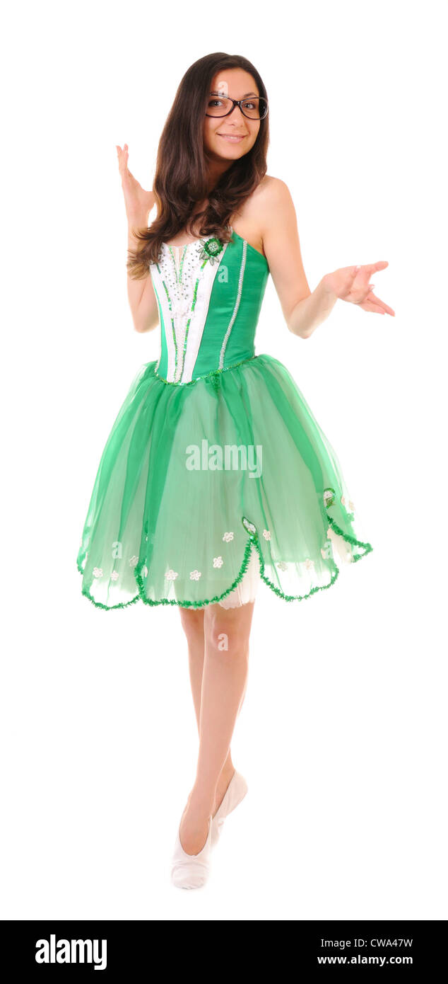 Dancing young woman in green ballet dress isolated on white background Stock Photo