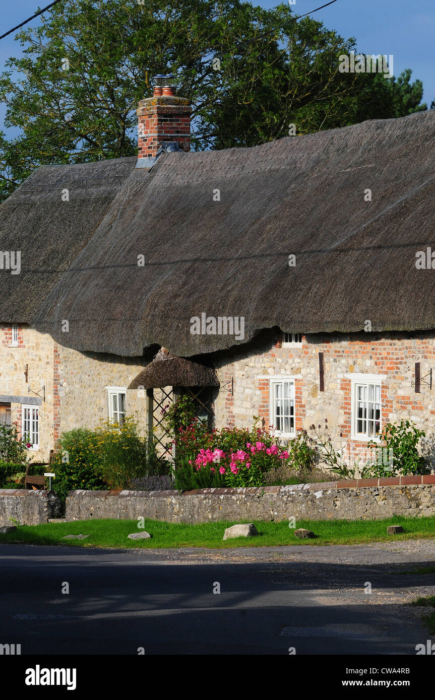 A traditional thatched cottage UK Stock Photo