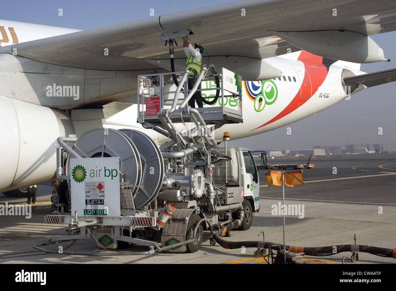 Dubai, a unit of Emirates airline at Dubai International Airport is refueled Stock Photo