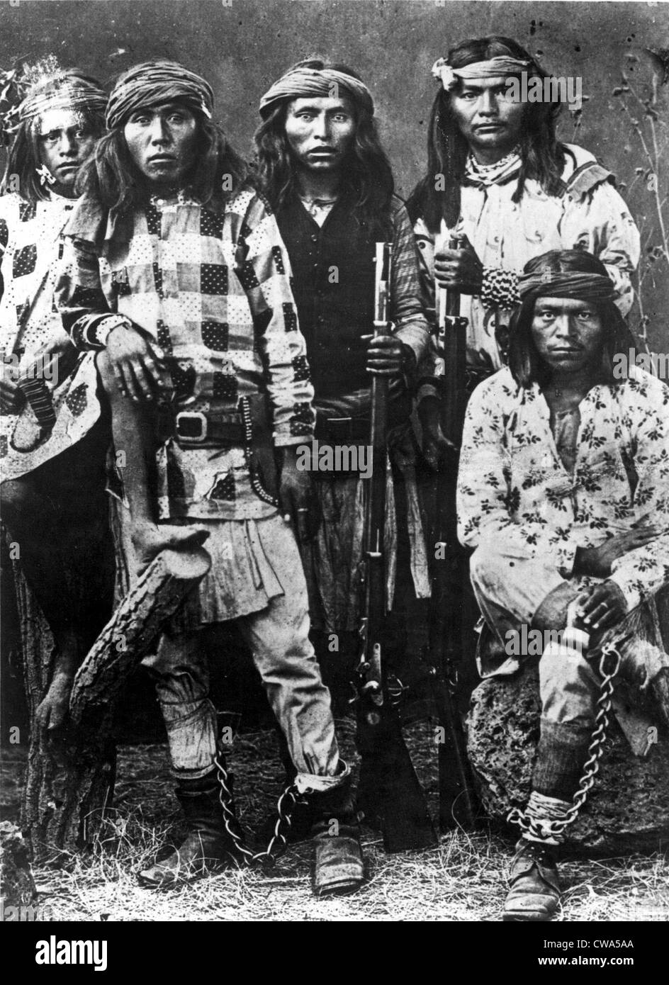 APACHE INDIANS-A group of Apaches, two of whom are in chains and soon to be hanged.. Courtesy: CSU Archives / Everett Collection Stock Photo