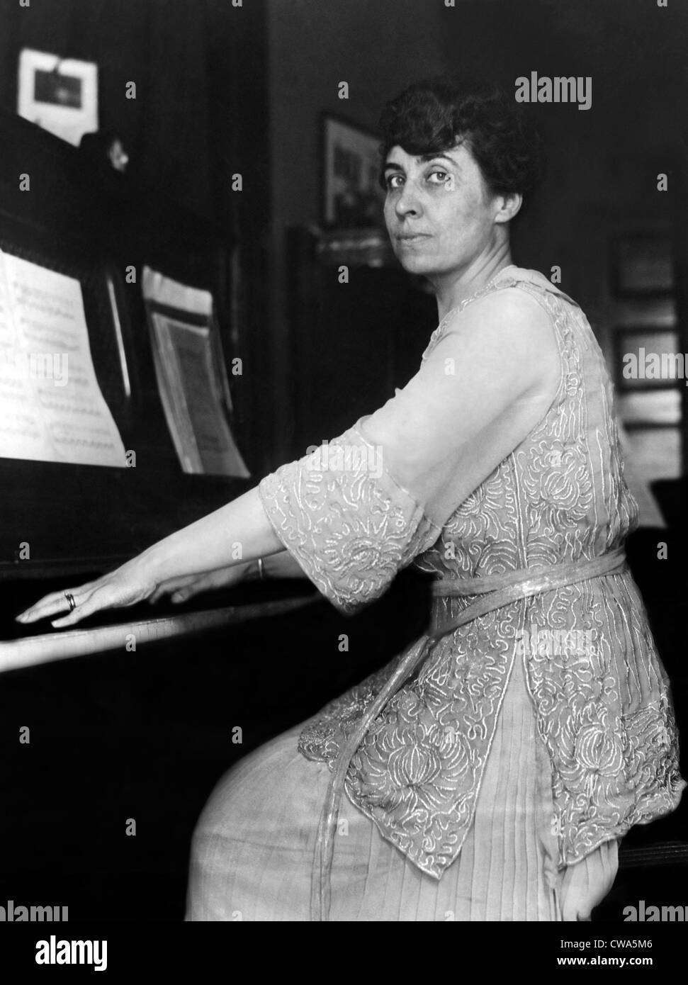 Grace Coolidge, wife of the vice-presidential nominee, plays the piano at her home in Northampton, Massachusetts, 1920. Stock Photo