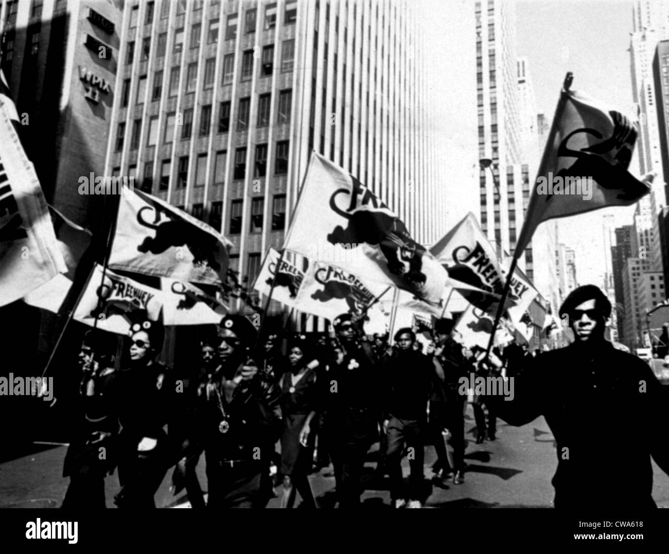 NEW YORK: Black Panther Party march along 42nd Street en route to a scheduled news conference at United Nations Plaza. The Stock Photo