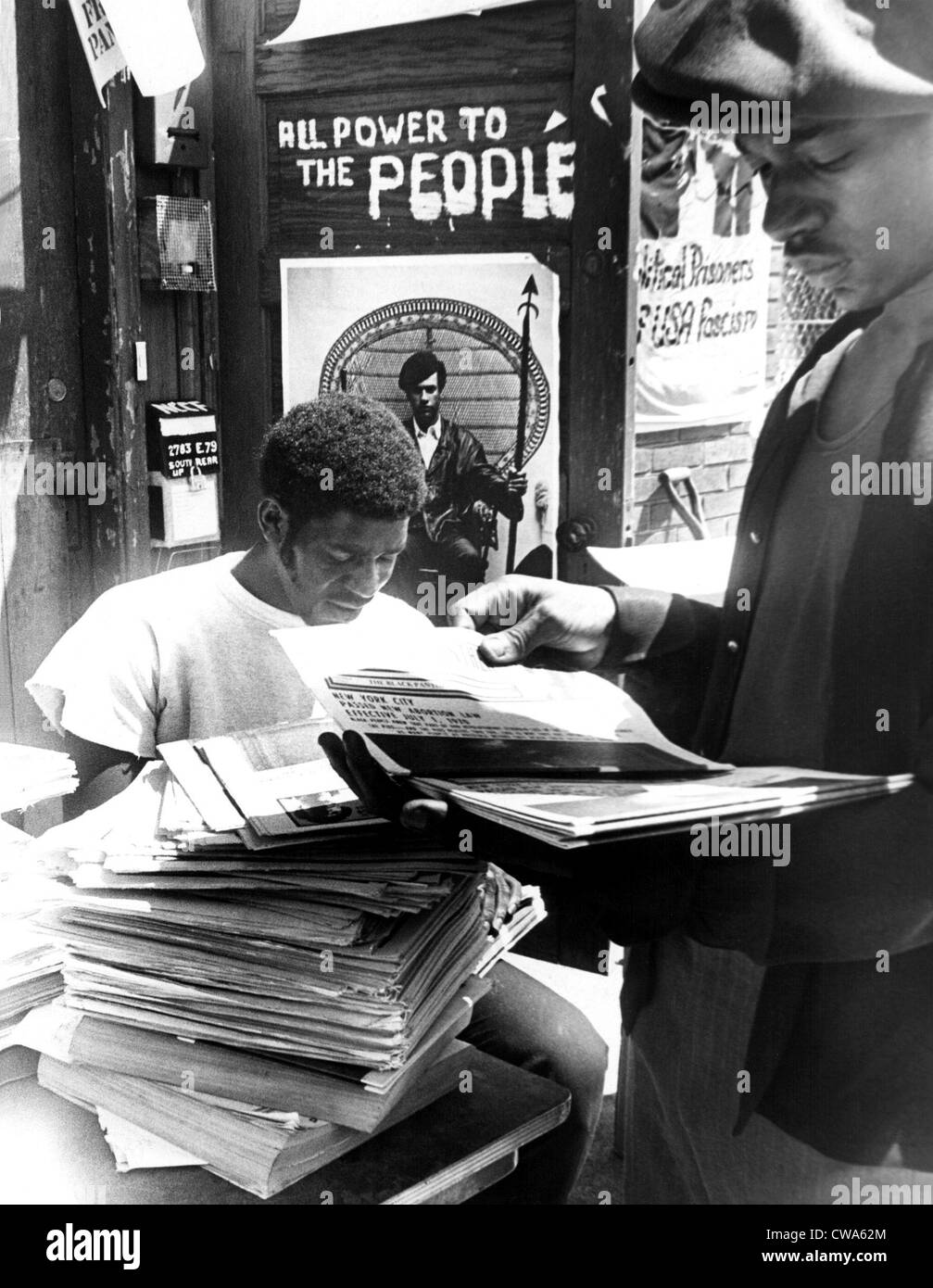 Two members of the Black Panther Party (Cleve Simpson, age 22, and David Hall, age 22) count issues of The Black Panther, July Stock Photo