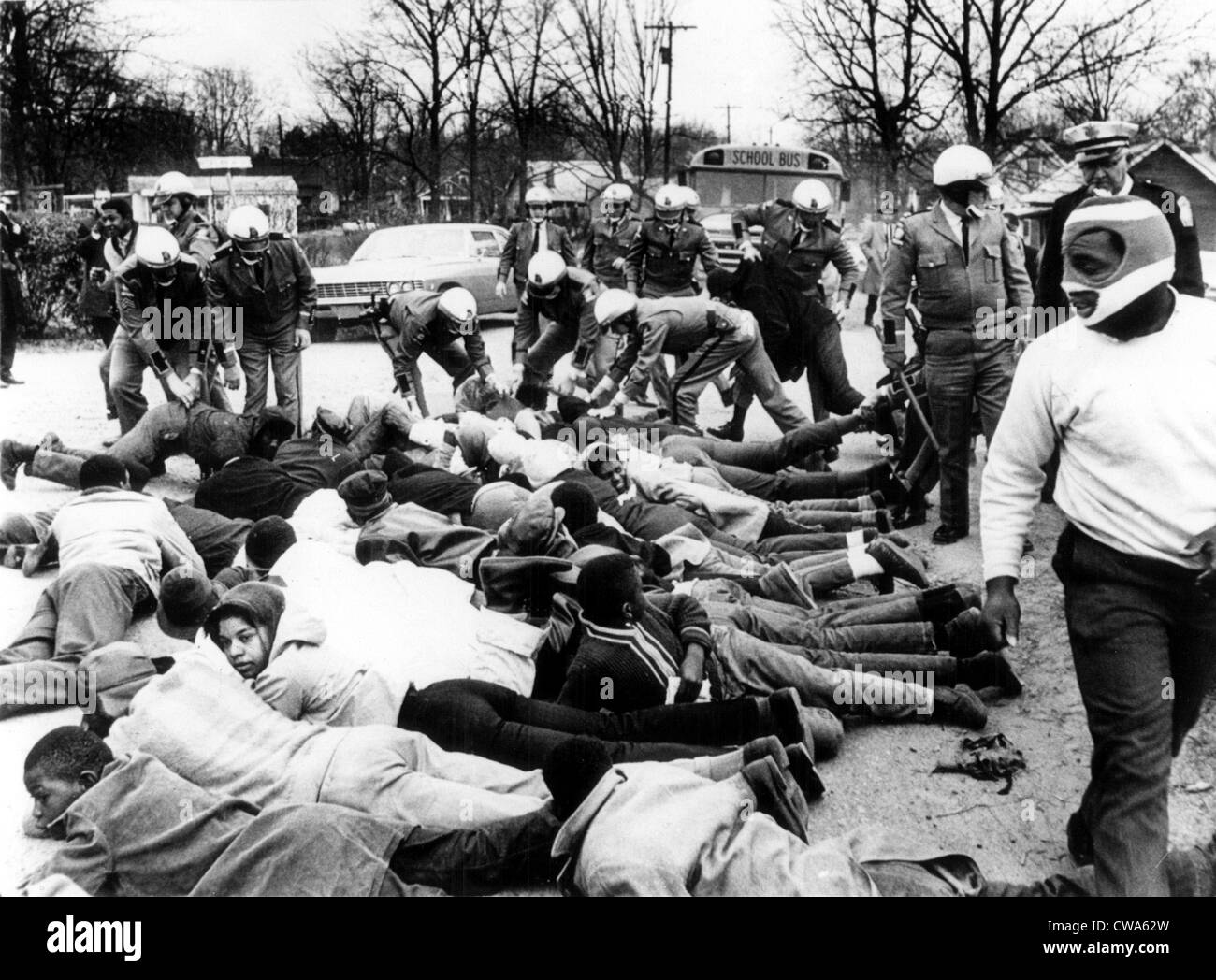 CIVIL RIGHTS, Social Circle, Georgia, State troopers arrest demonstrators blocking the path of a school bus protesting school Stock Photo