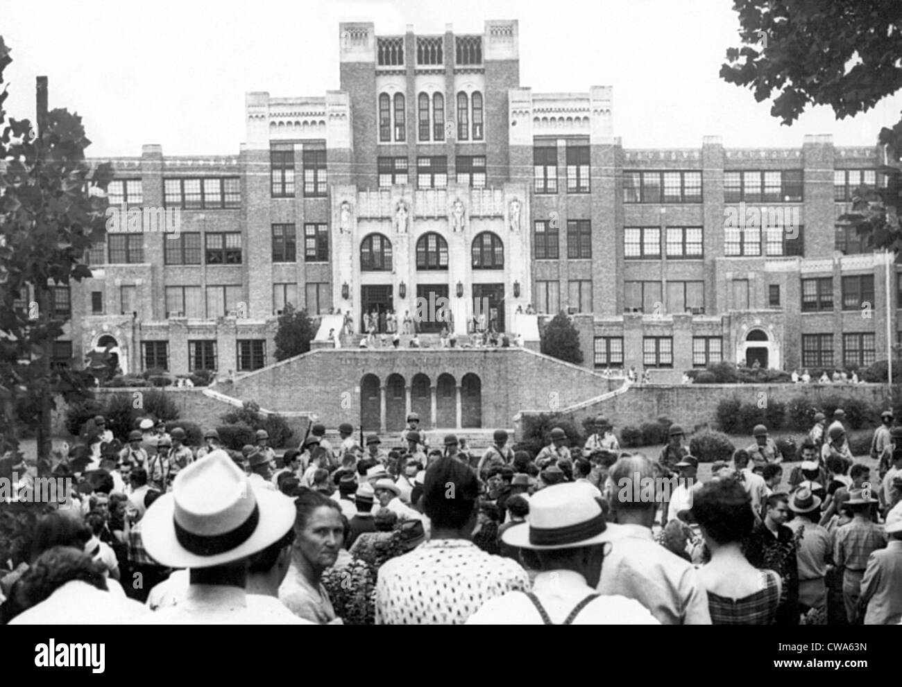 Crowd gathered in front of Little Rock Central High School as National Guardsmen barred black students from entering the Stock Photo