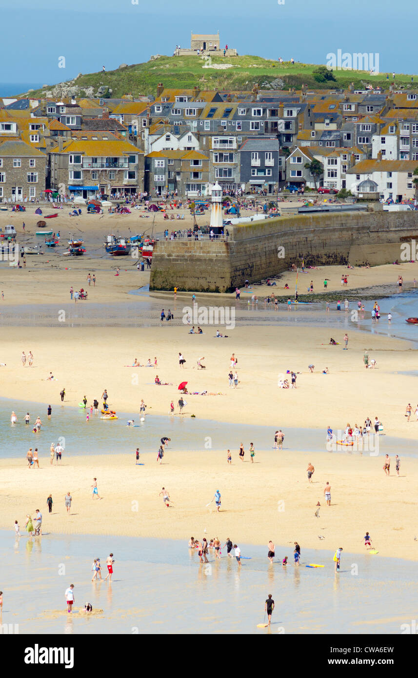 St. Ives harbour beach at low tide on a sunny day in Cornwall UK. Stock Photo