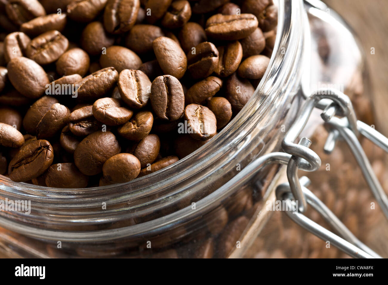 detail of coffee beans in glass jar Stock Photo