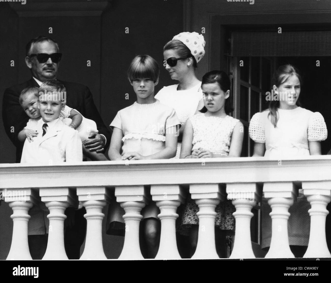 The Royal Family watching the U.S. Air Force band perform from the Palace balcony. L-R: Prince Rainier of Monaco holding Stock Photo