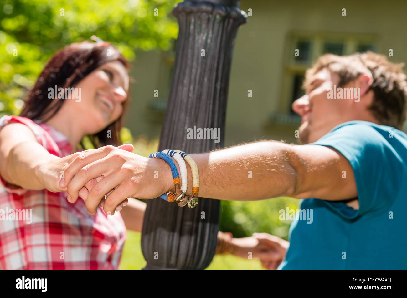 Playful couple having fun in the park happy smiling love Stock Photo ...