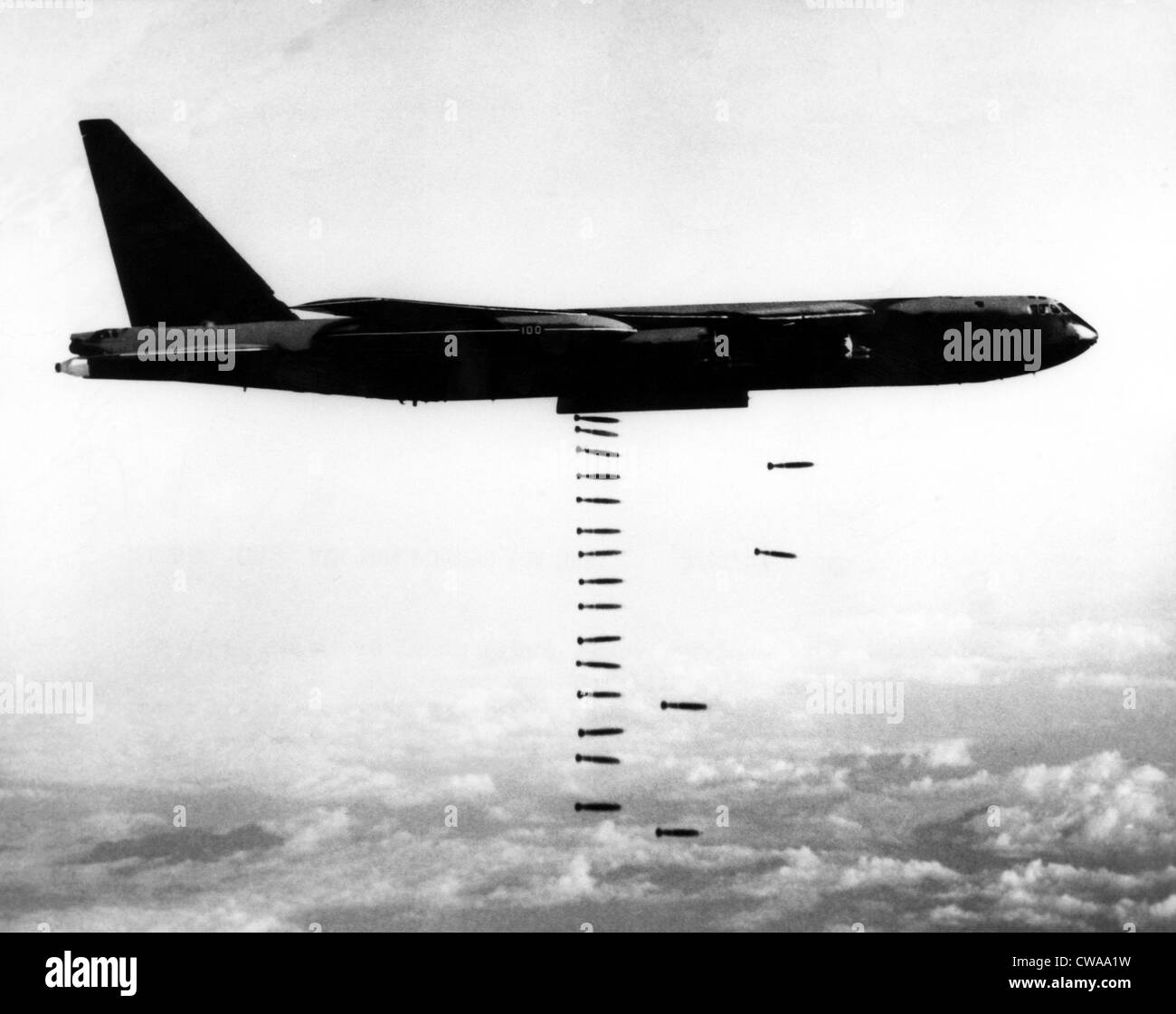 A B-52 Stratofortress releases bombs on Vietnamese troop concentrations in South Vietnam, March 31, 1967. Courtesy: CSU Stock Photo