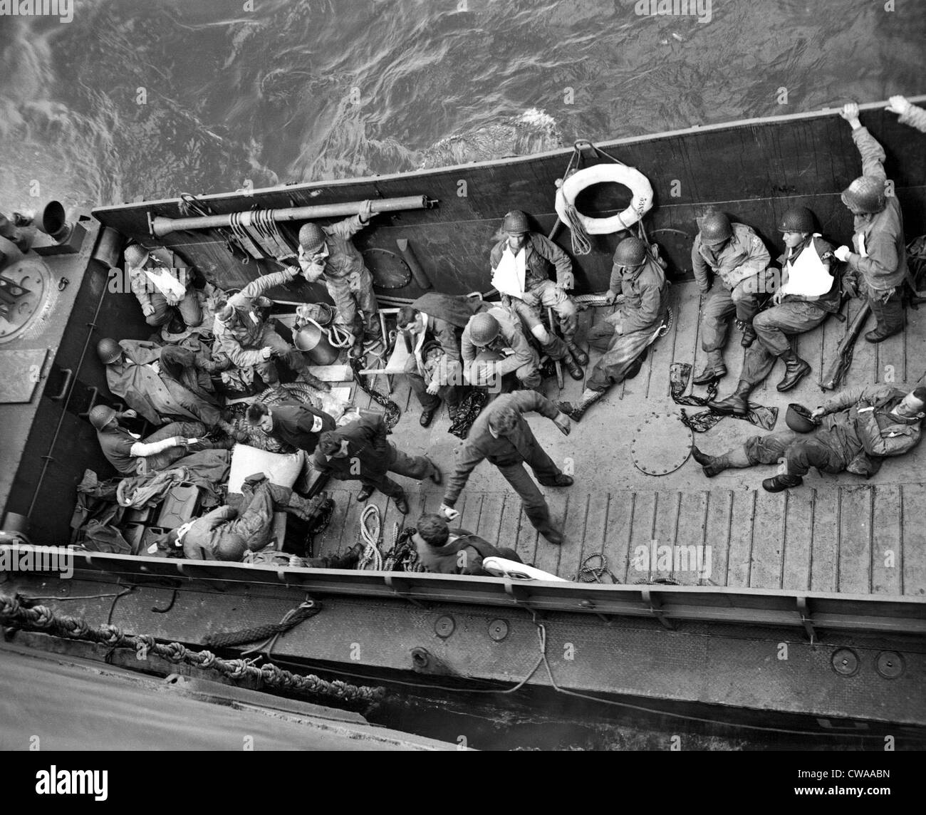 June 6, 1944 A Coast Guard landing barge ties up alongside a Coast