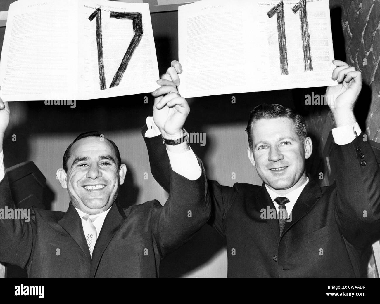 Yogi Berra and Whitey Ford hold up their 17th and 11th contracts with the Yankees, respectively, 1962. Courtesy: CSU Stock Photo