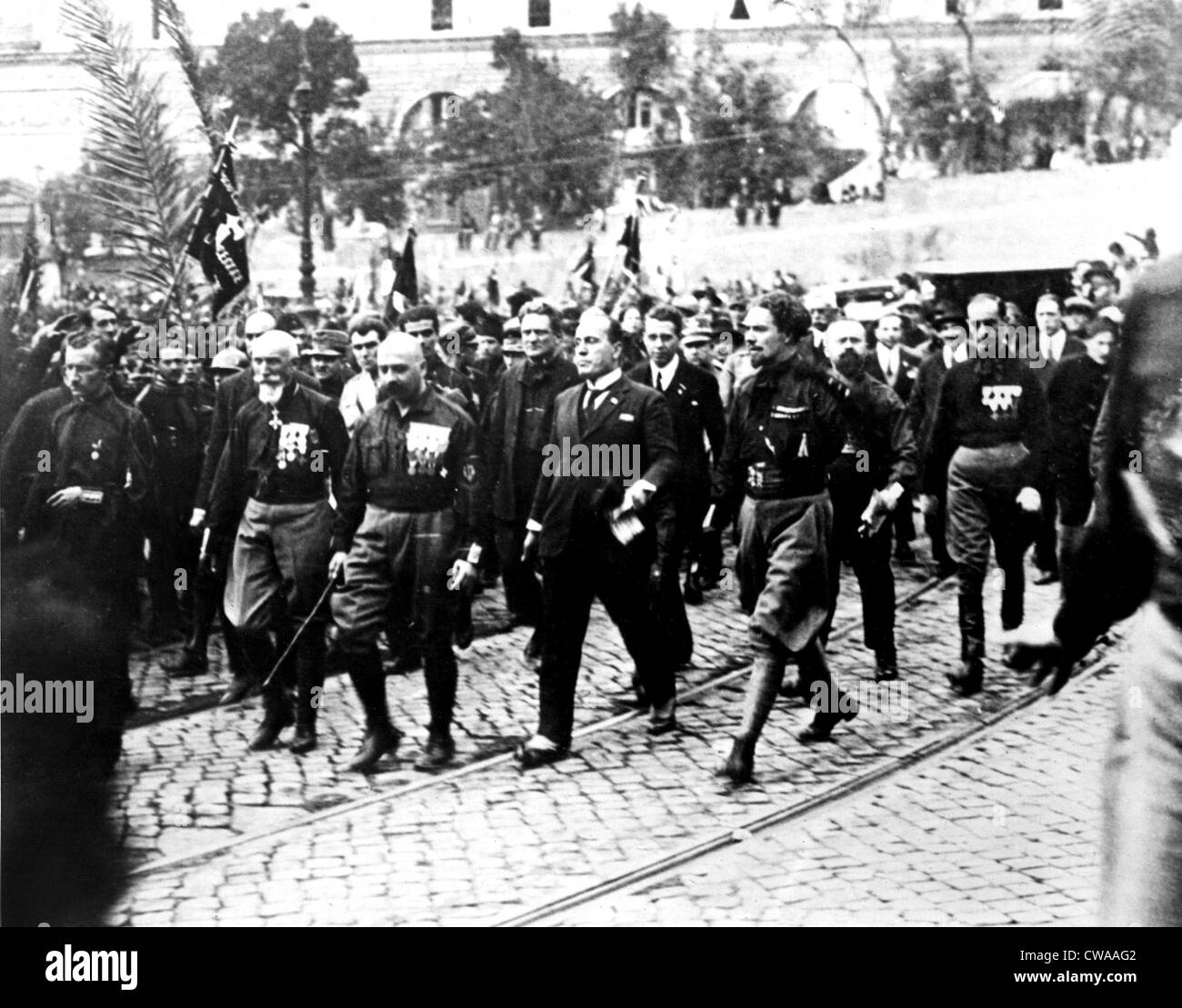 ROME, ITALY--Followed by his black-shirted Facists--40,000 strong-- Benito Mussolini (center) marches on Rome October 29, 1922, Stock Photo
