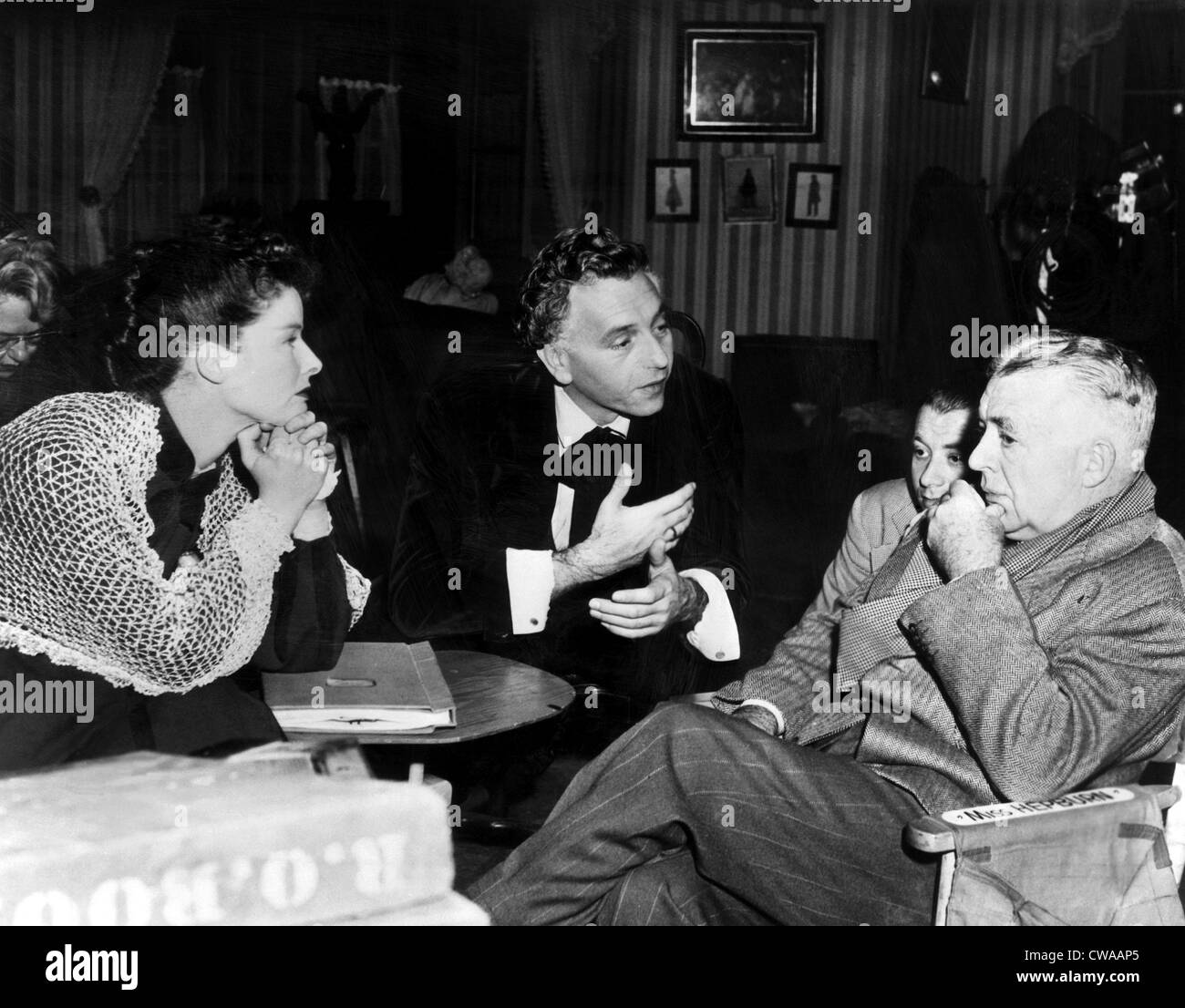 SONG OF LOVE, Katharine Hepburn, Paul Henreid, director Clarence Brown, on set, 1947. Courtesy: CSU Archives/Everett Collection. Stock Photo