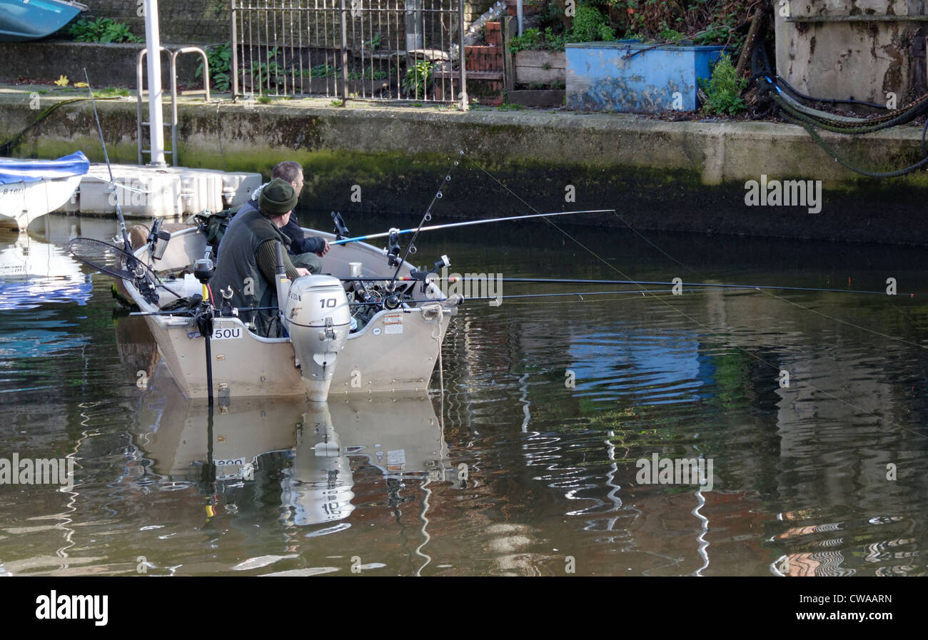 Two men fishing from a boat hi-res stock photography and images - Alamy