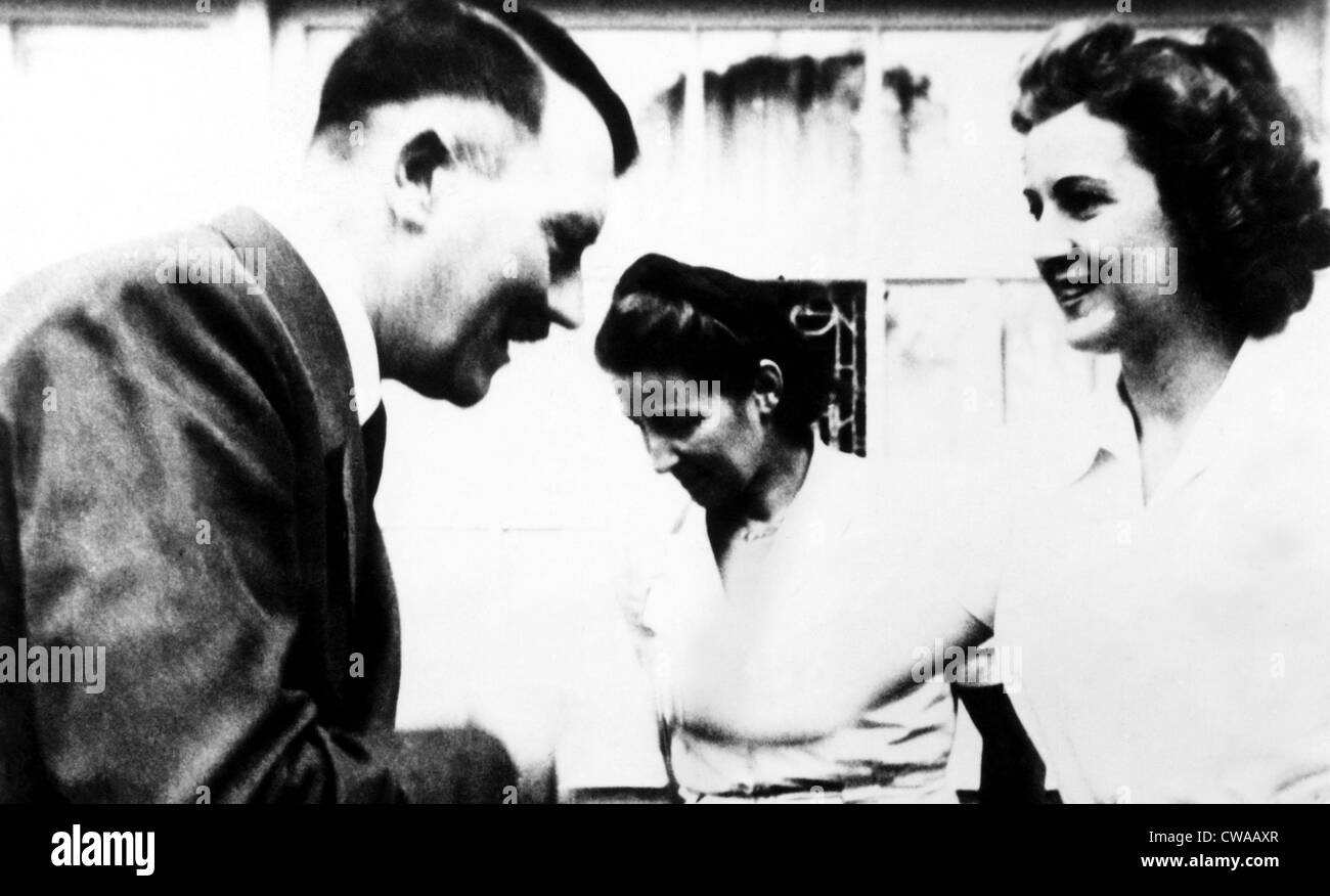 Adolf Hitler greeting Eva Braun at Obersalzberg. ca.1940s. Courtesy: CSU Archives/Everett Collection Stock Photo