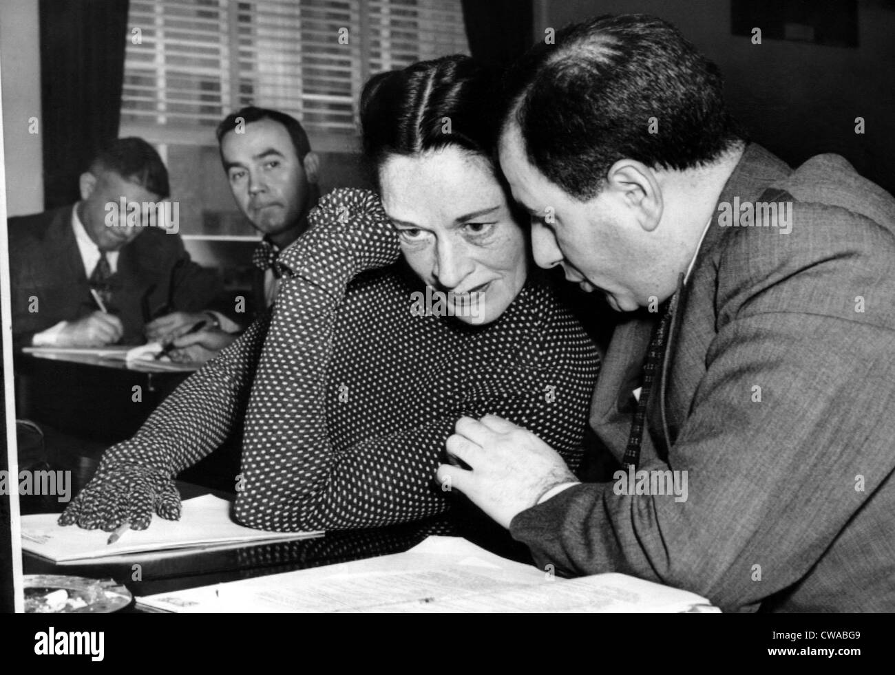 Actress Anne Revere with her attorney R. Lawrence Siegal, testifying before the House Un-American Activities Committee, 1951.. Stock Photo