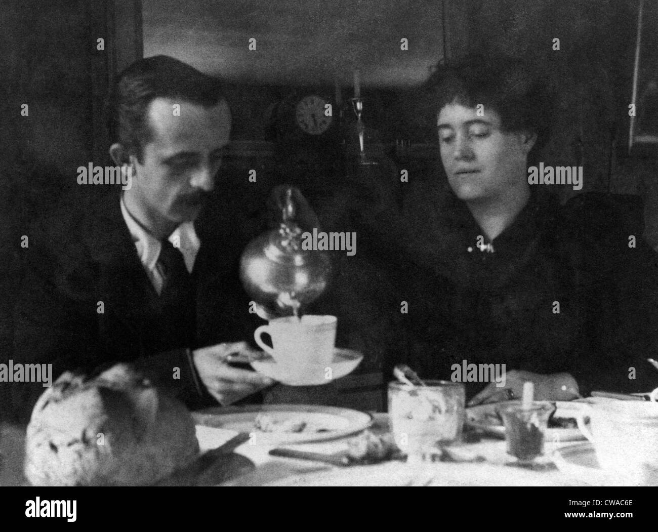 Barrie, J. M. (James Matthew), (1860-1937) having tea with a women friend. Published in 'Allahakbarries,' a book Barrie printed Stock Photo