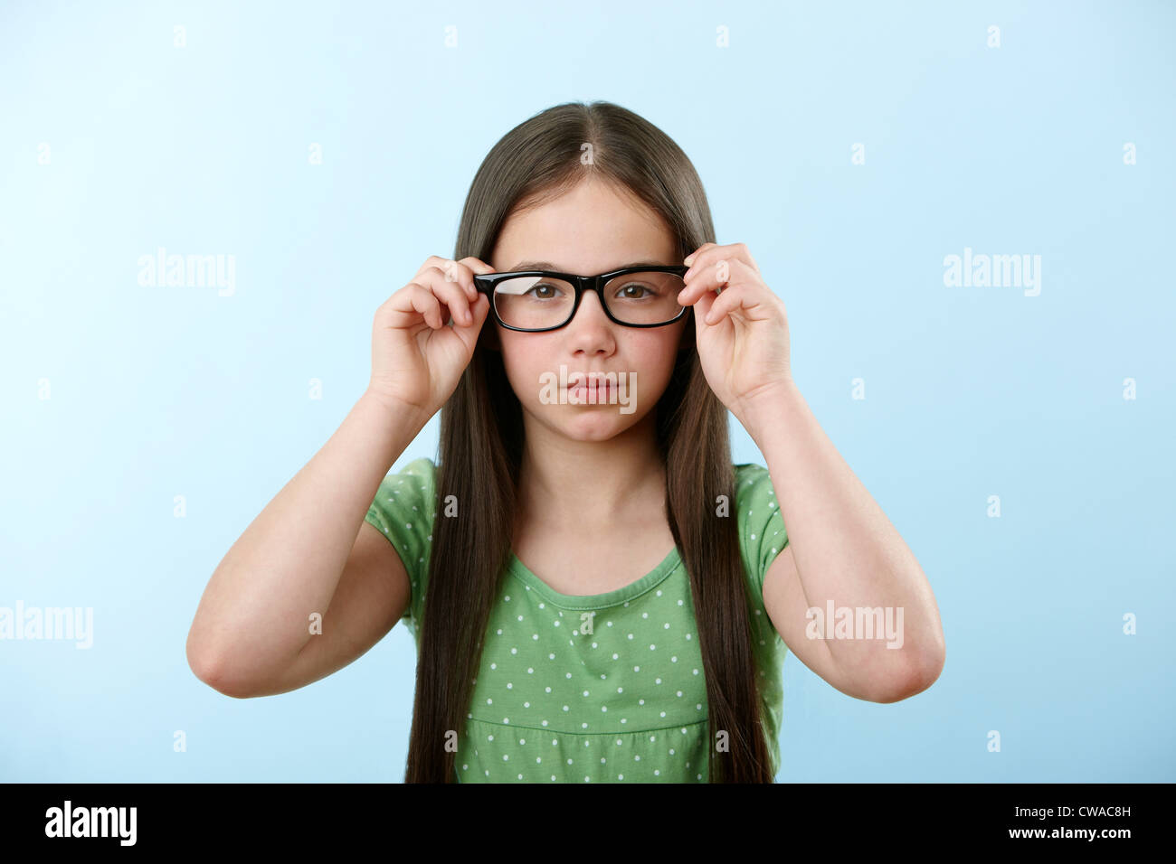Girl wearing glasses Stock Photo - Alamy