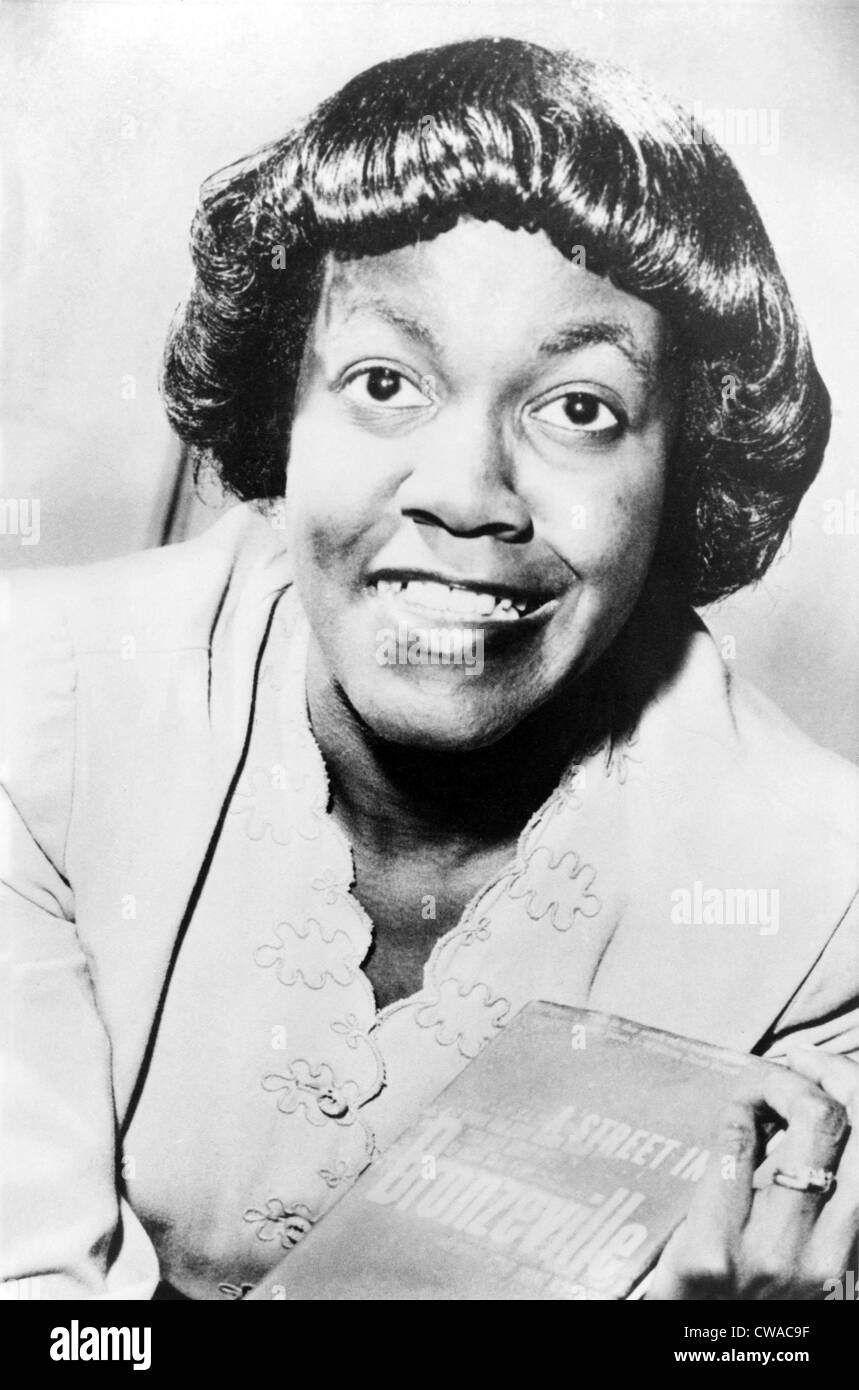 Gwendolyn Brooks (1917-2000) holding her book, 'A Street in Bronzeville,' her first book of poetry published in 1945.  She won Stock Photo