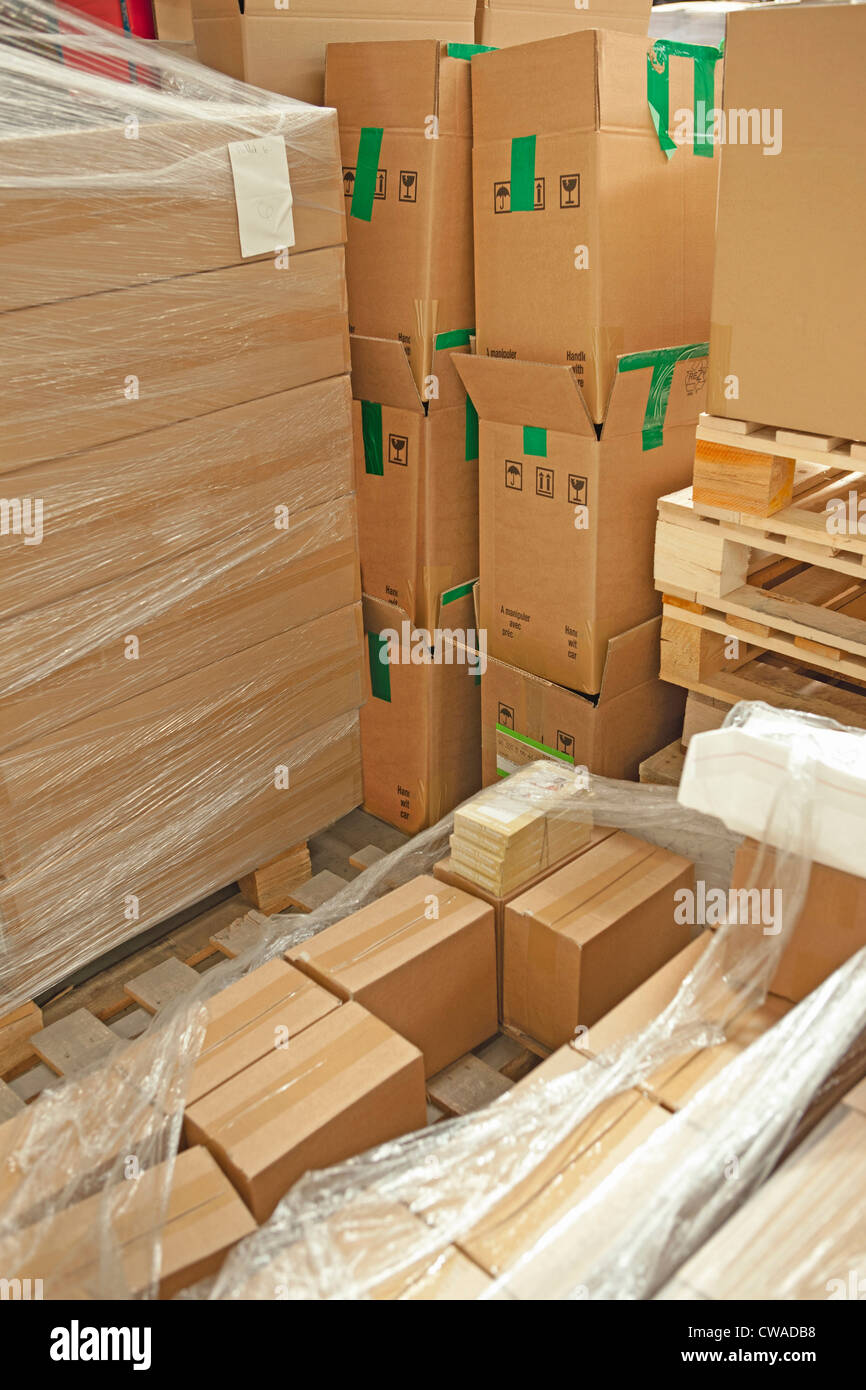 Cardboard boxes in warehouse Stock Photo Alamy