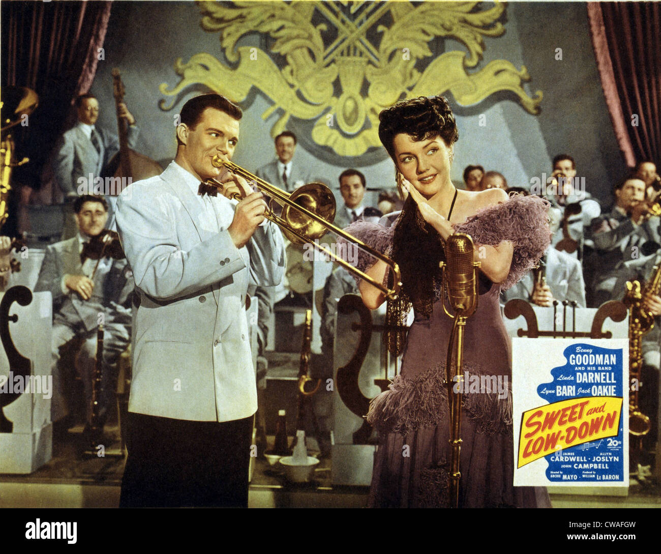 Lobby card for SWEET AND LOW-DOWN, showing stars Benny Goodman (1909-1986), playing trombone, and Linda Darnell (1921-1956), on Stock Photo