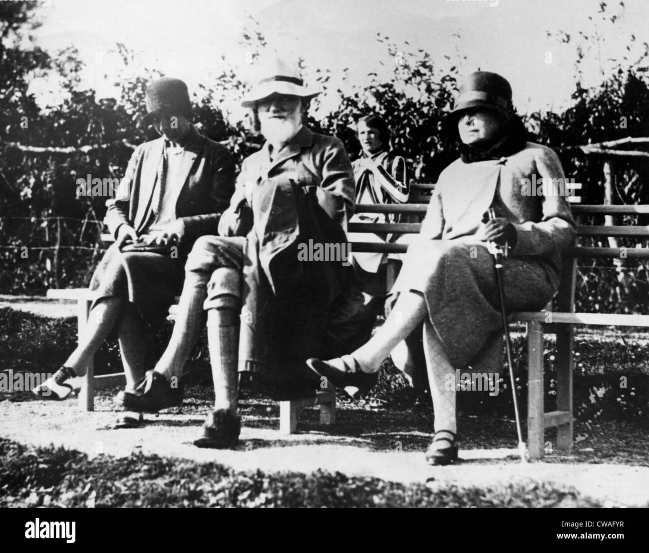 Irish author and playwright George Bernard Shaw (center), on vacation with his wife Charlotte-Payne Townhend (far left), on the Stock Photo