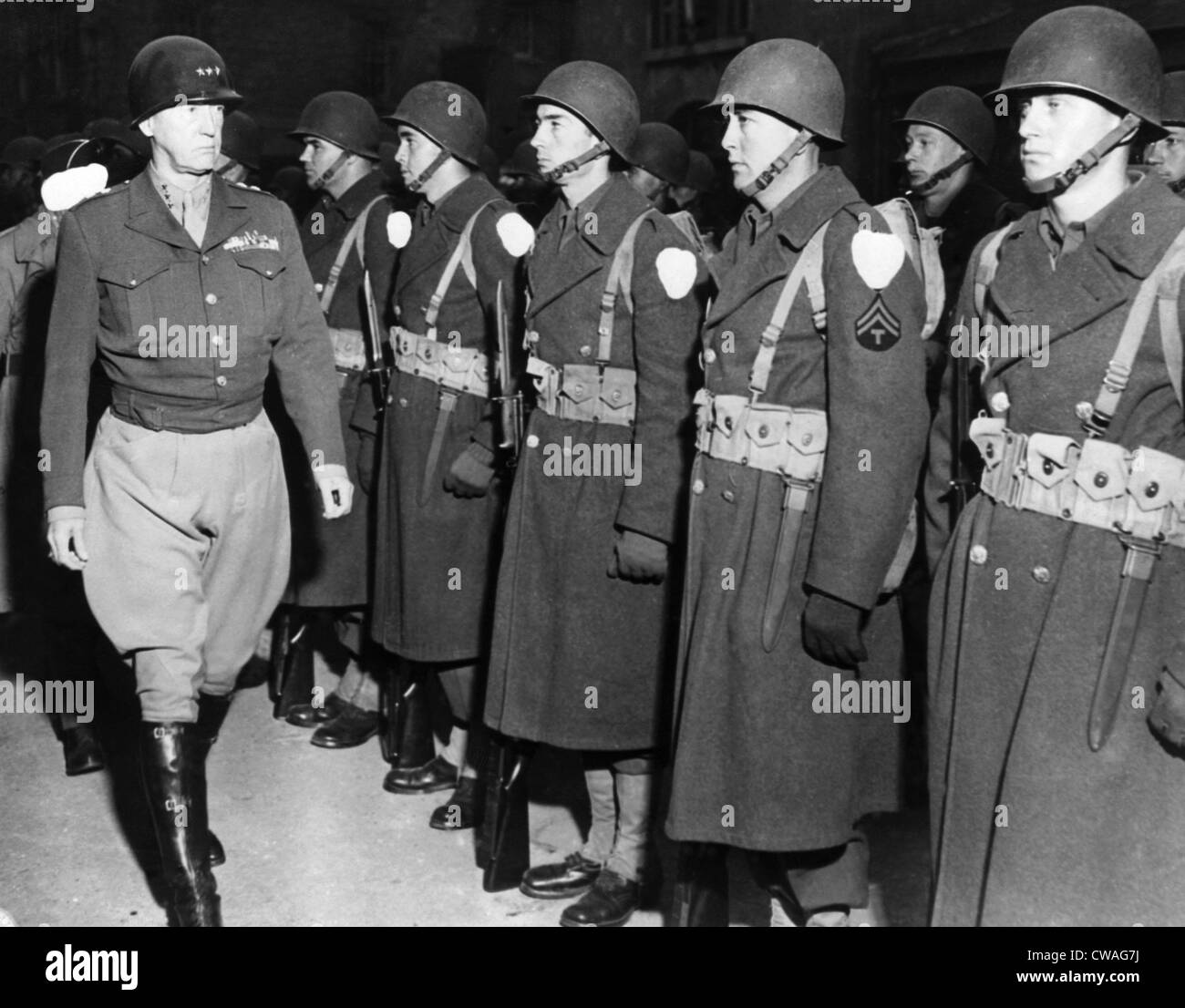 Lieutenant General George Patton (left), inspecting troops in the European Theatre of Operations, 1944.. Courtesy: CSU Archives Stock Photo
