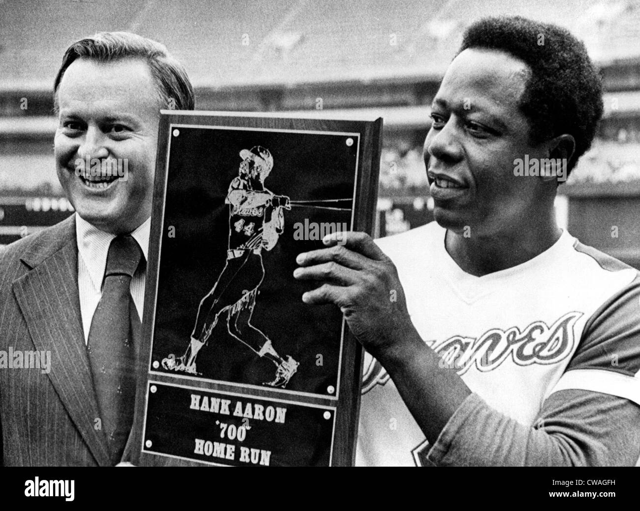 Atlanta Braves president William Bartholomay presents Hank Aaron with the plaque honoring his 700th home run, 1973. Courtesy: Stock Photo