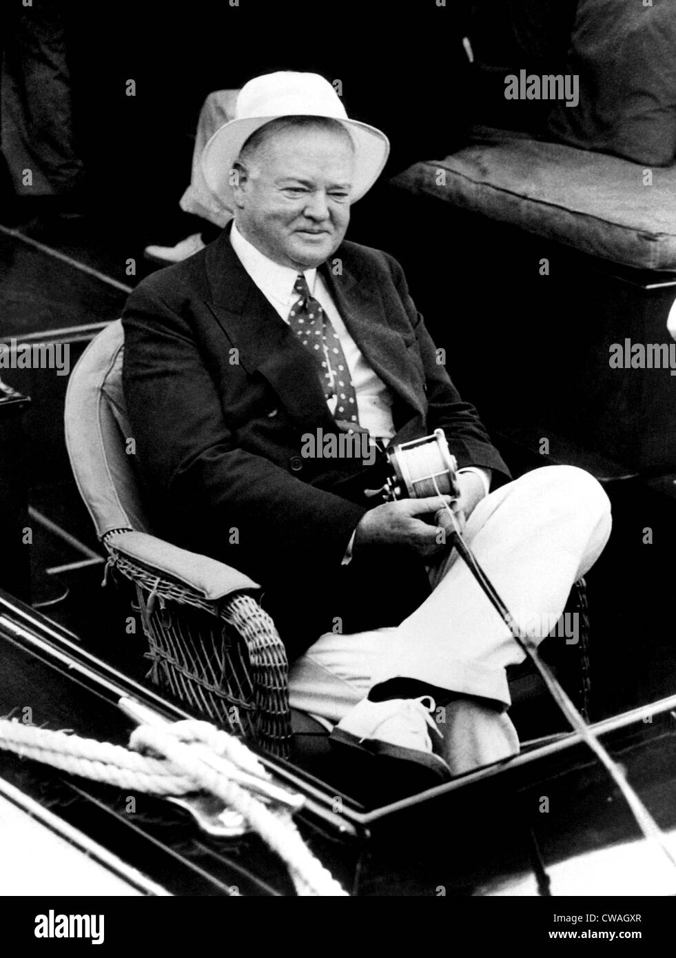 Former President Herbert Hoover fishing at Miami Beach. ca 1936