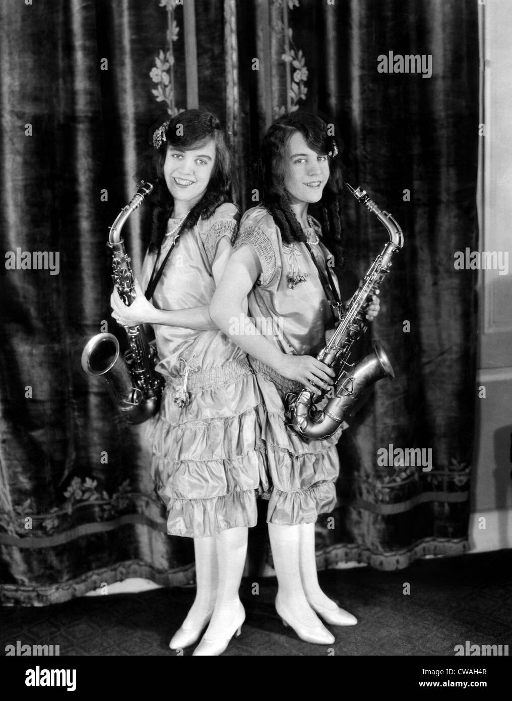 Conjoined twins Daisy and Violet Hilton, at age 16. 1924. Courtesy CSU Archives/Everett Collection. Stock Photo