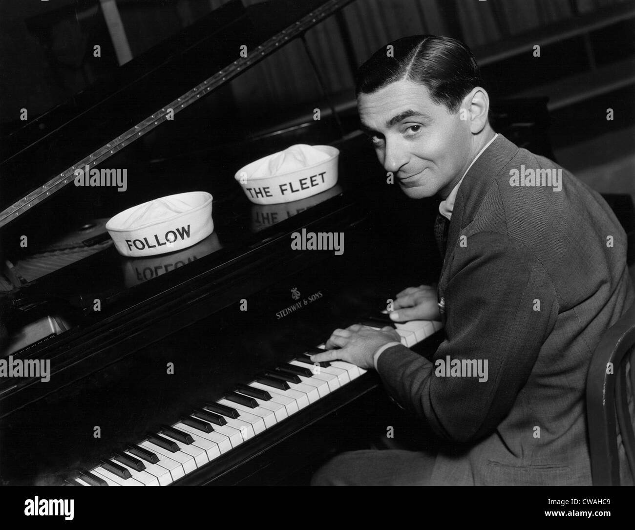 Irving Berlin, at piano, 1936, publicity shot for FOLLOW THE FLEET. Courtesy: CSU Archives / Everett Collection Stock Photo