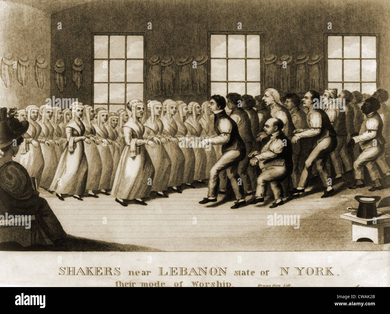 Shakers, separated by gender, performing a step dance in the meeting hall at New Lebanon, New York. Ca. 1830 Stock Photo