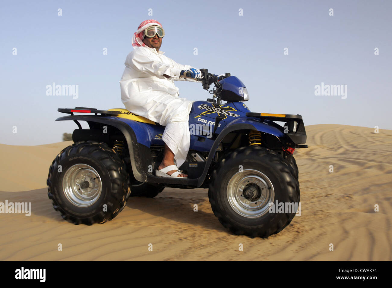 Dubai, quad riders in the desert Stock Photo