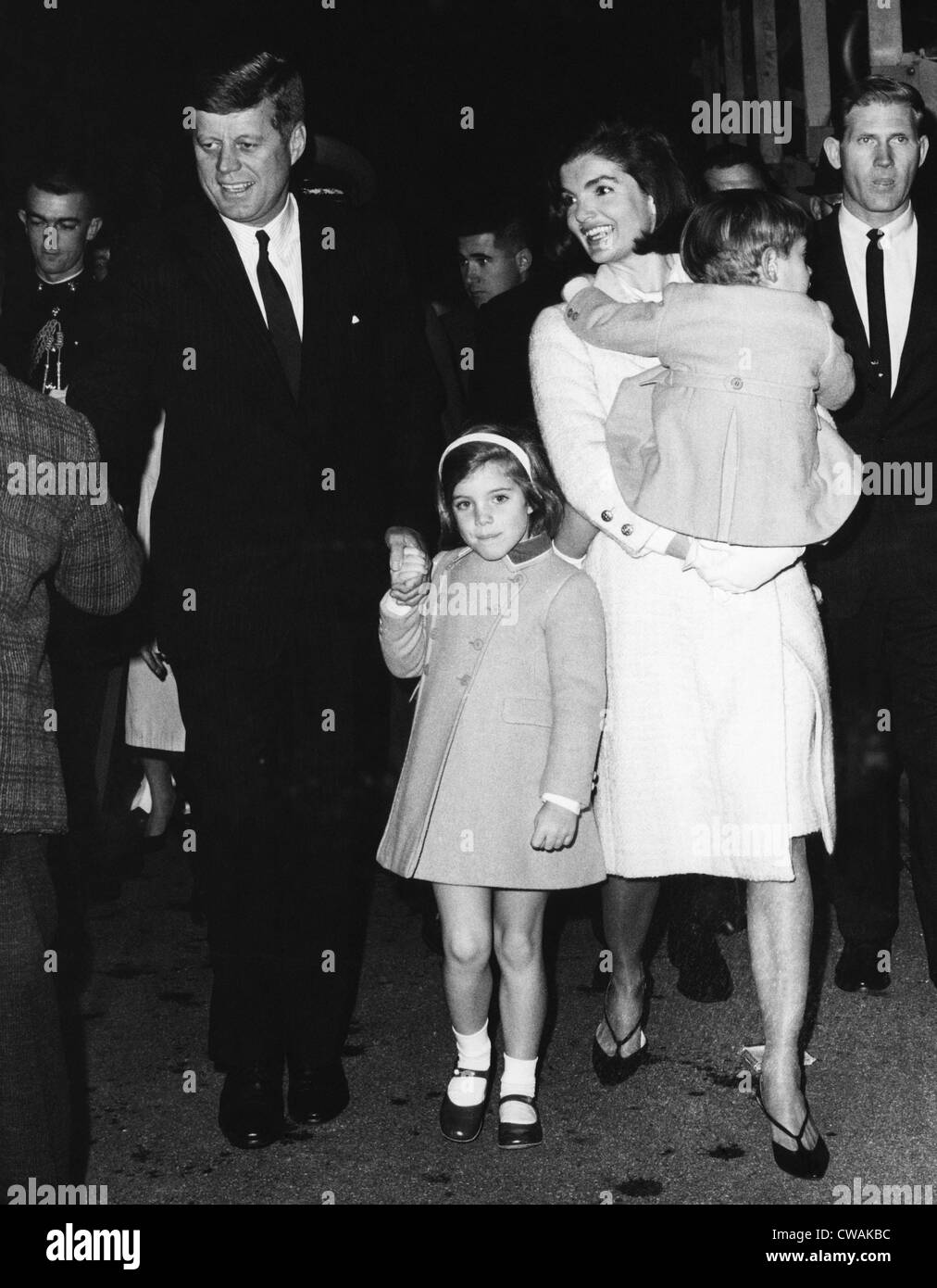 John F. Kennedy, Caroline Kennedy, Jacqueline Kennedy holding John F. Kennedy Jr., November 18, 1963. Courtesy: CSU Stock Photo