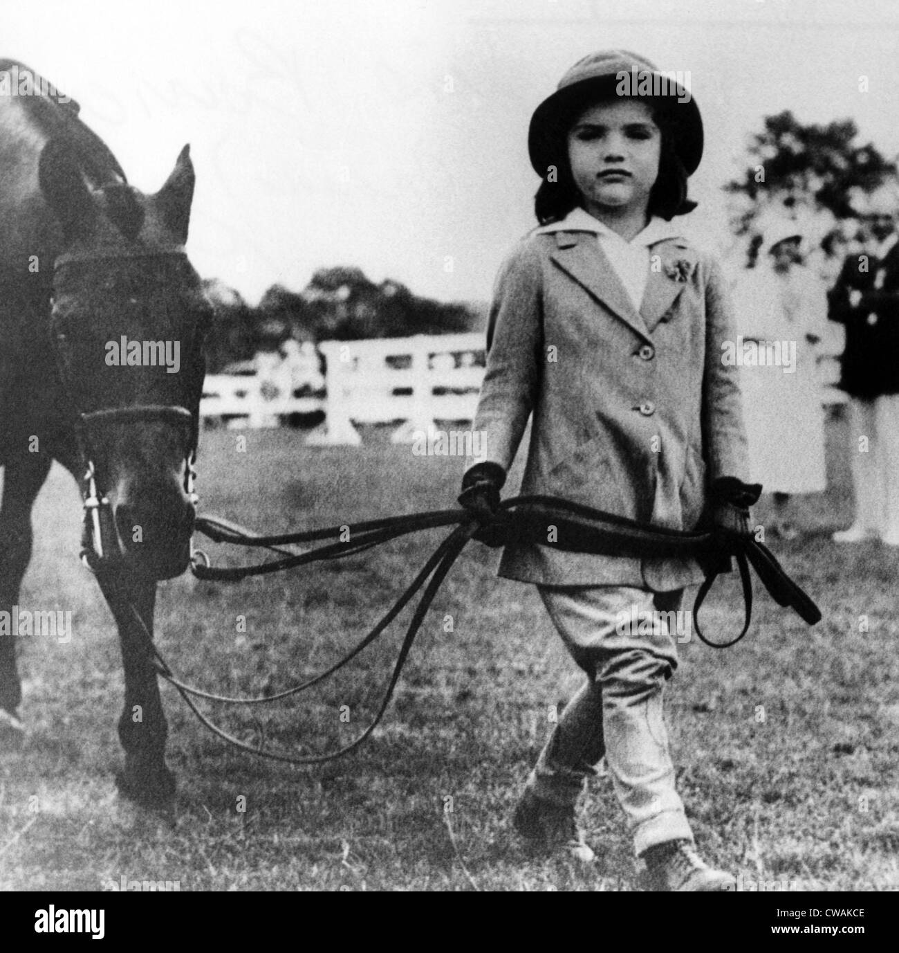 Jacqueline Bouvier age 4, with her pony at a Southampton horse show, ca. 1933. Courtesy: CSU Archives/Everett Collection. Stock Photo