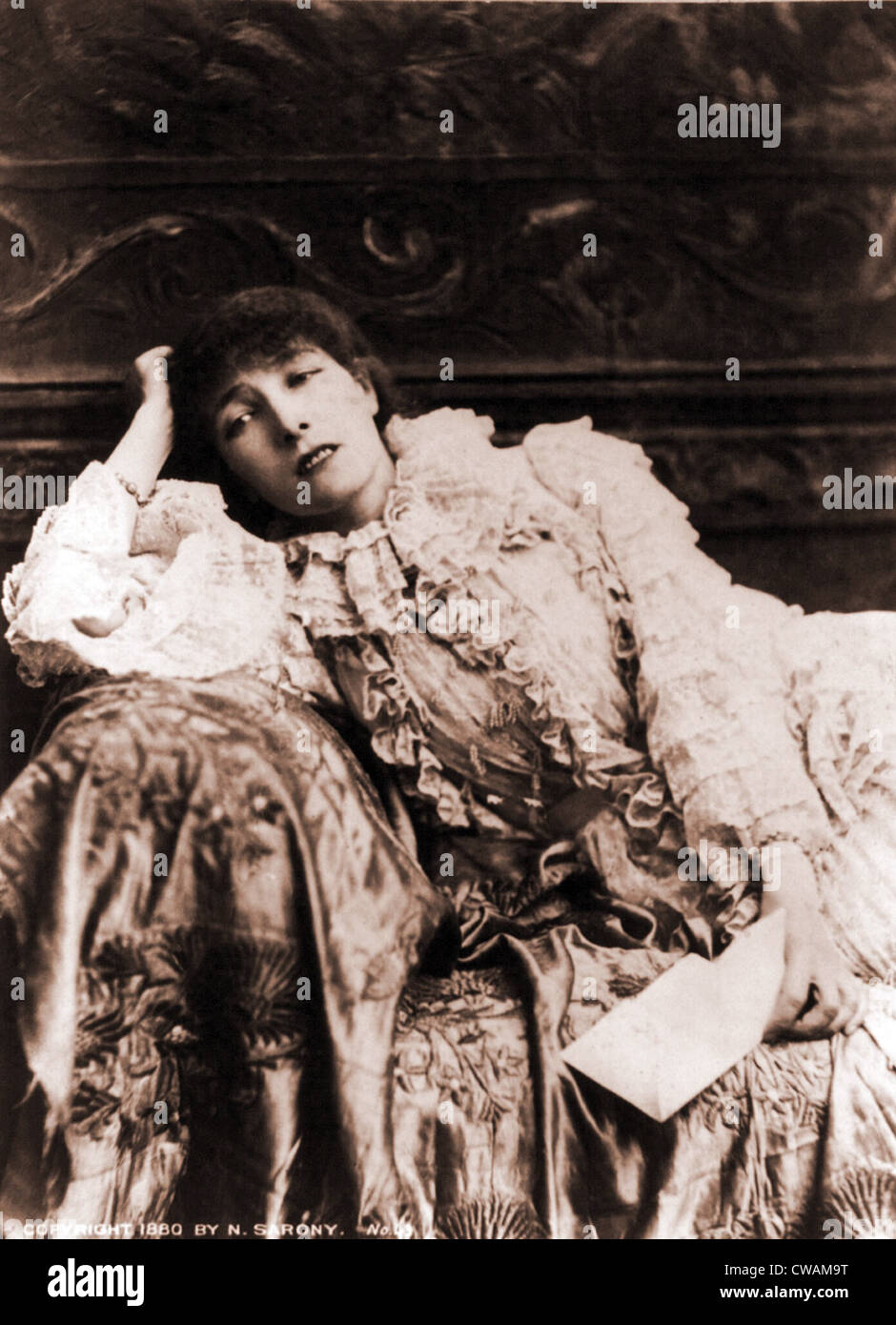 Sarah Bernhardt (1844-1923), French actress, reclining on a divan in an 1880's portrait. Stock Photo