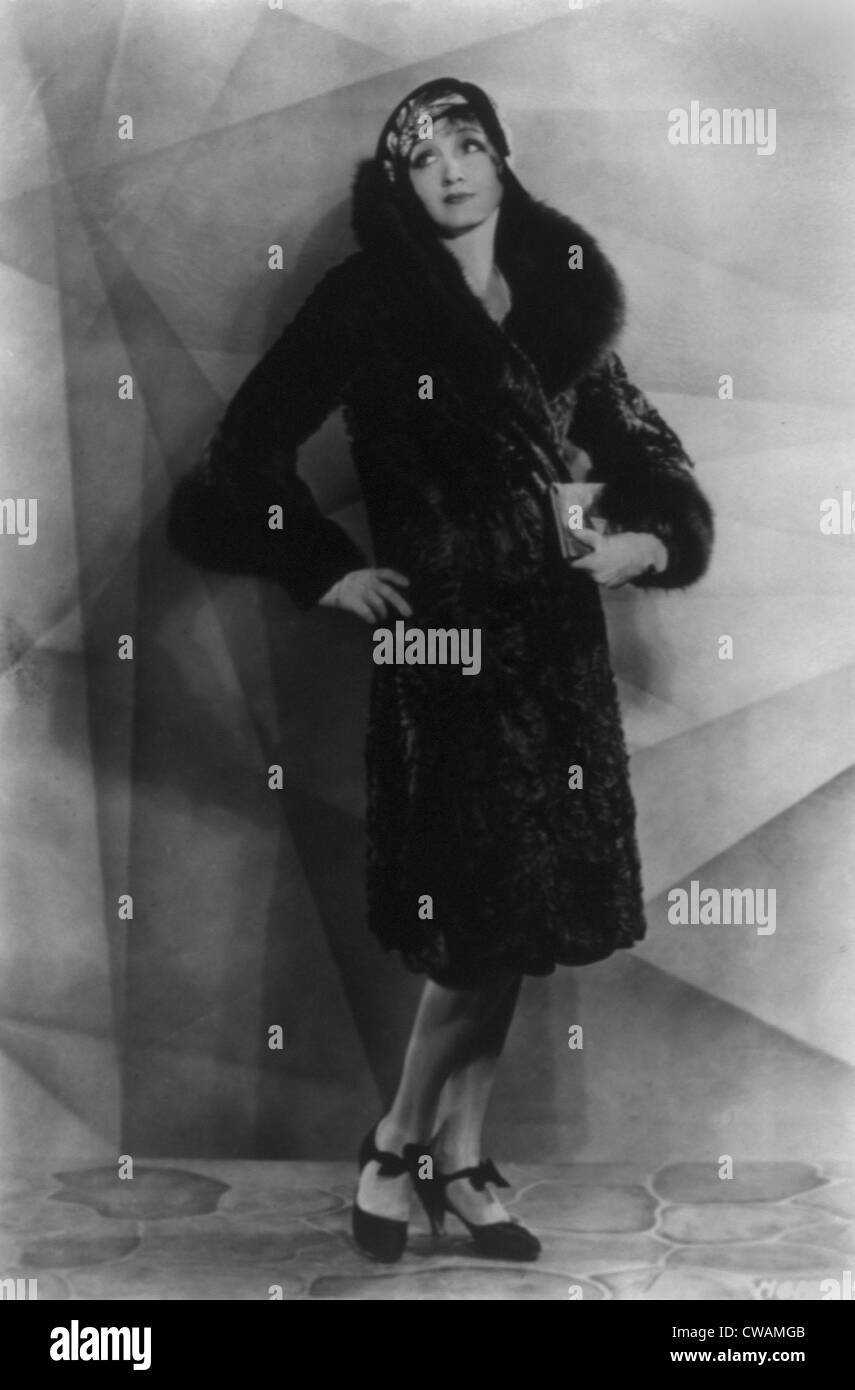 Hedda Hopper (1890-1966), as a young actress, modeling a fur coat.  1929. Stock Photo