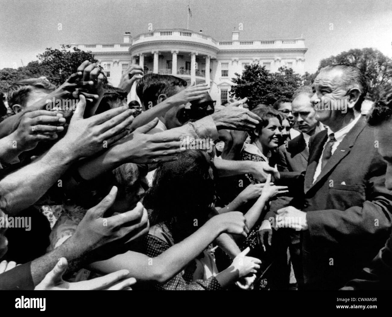 President Lyndon B. Johnson greets part of the 9,000 young men and women working in Washington as summer interns in goverment Stock Photo