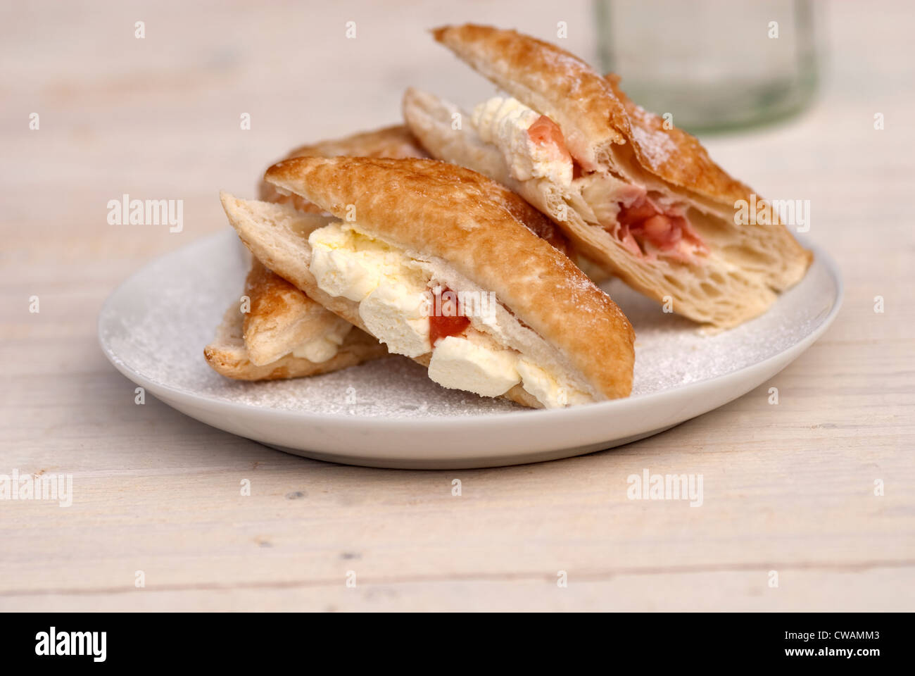 food photography of apple and strawberry cream turnover bun Stock Photo