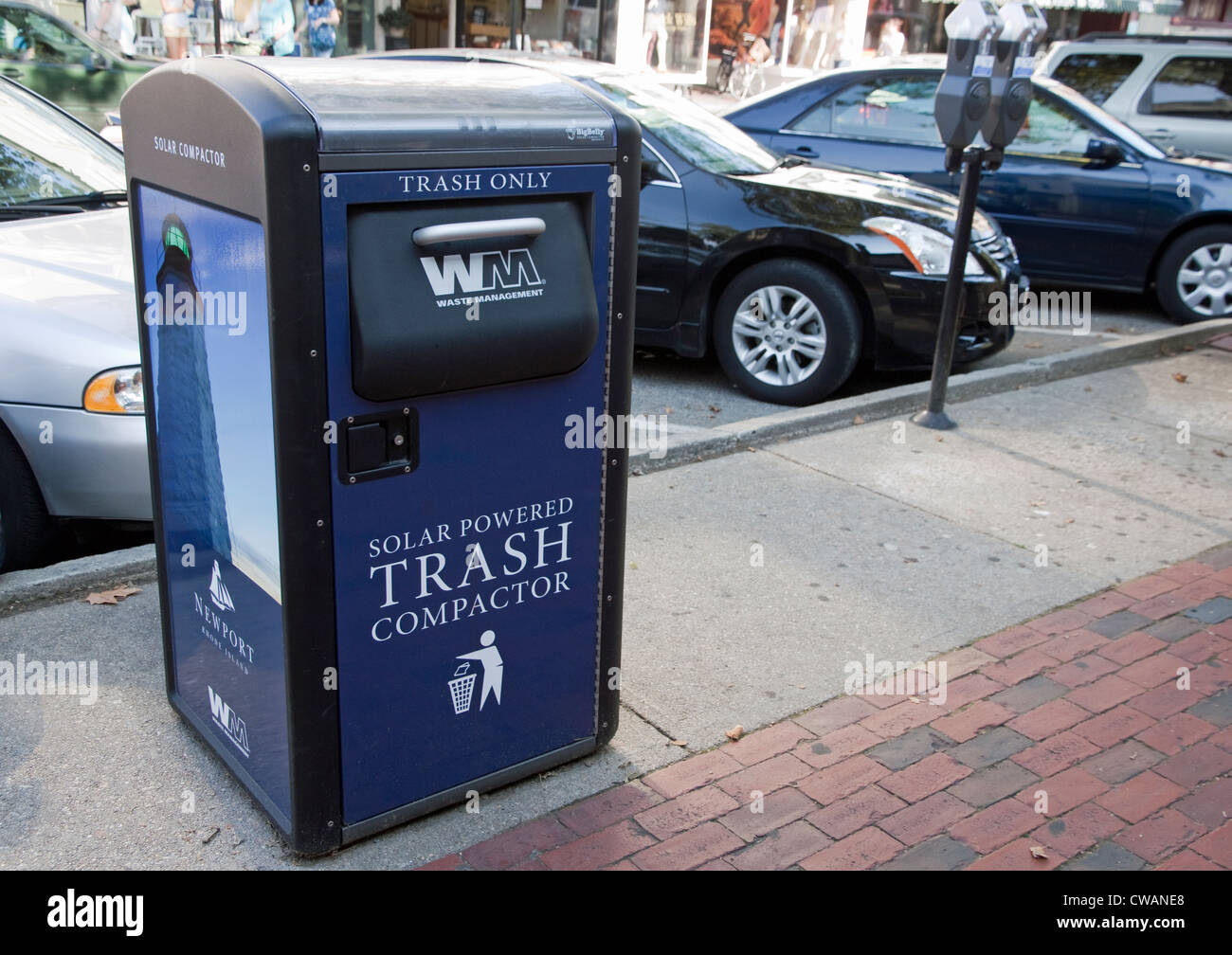 Solar powered trash compactor.   Money's saved on collection (holds 5x), fuel, maintenance, labor=less greenhouse gas emission. Stock Photo