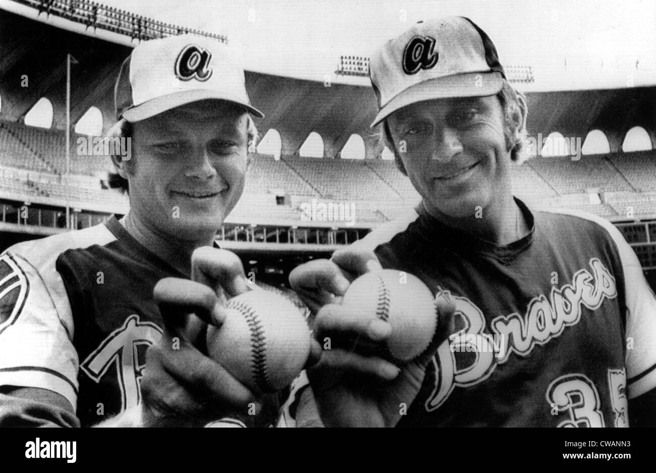 Atlanta Braves pitchers Joe Niekro, Phil Niekro demonstrate their knuckleball grips before a game in St. Louis, 1973. Courtesy: Stock Photo