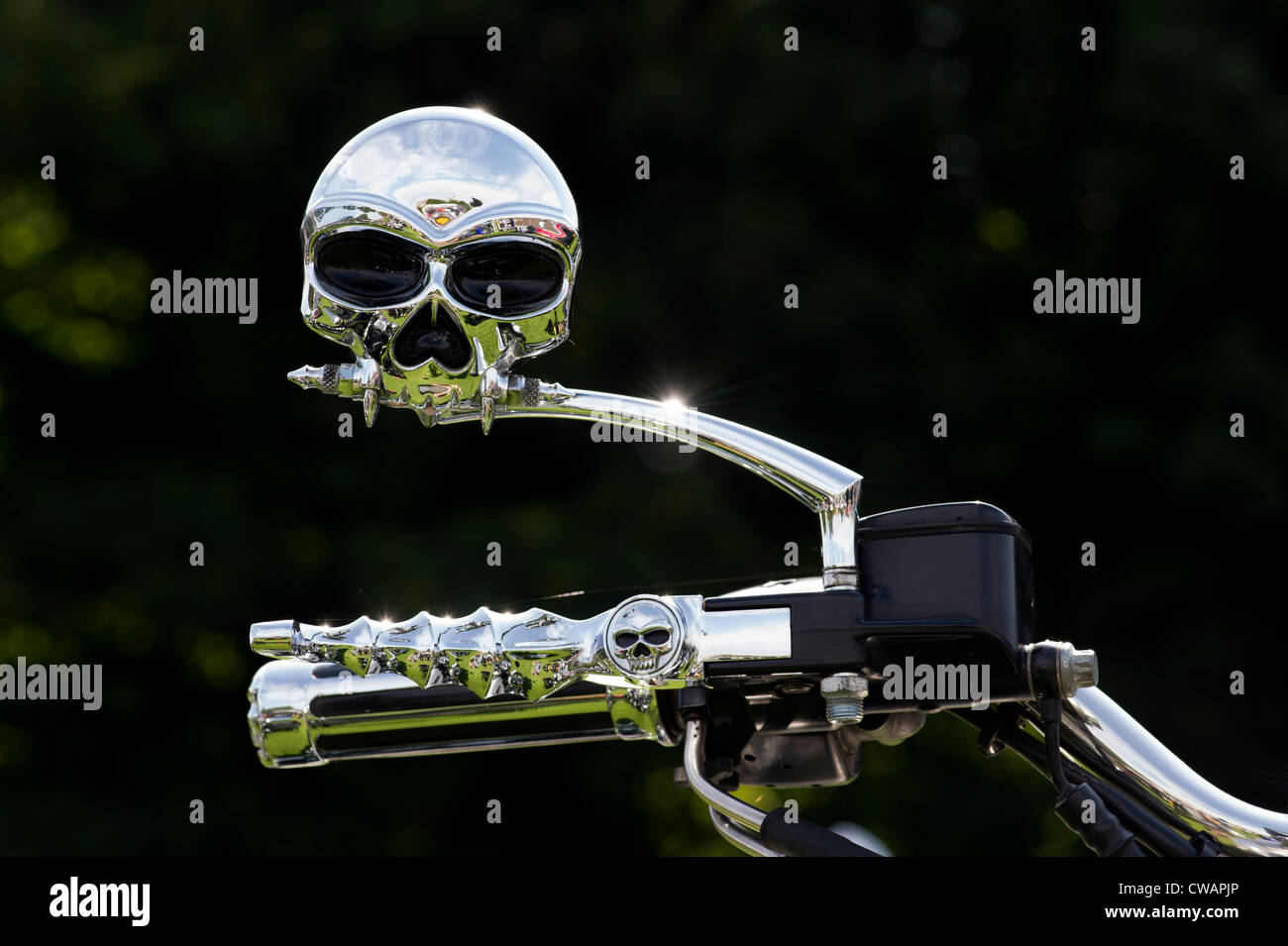 Harley Davidson motorcycle skull handlebar brake lever and wing mirror Stock Photo
