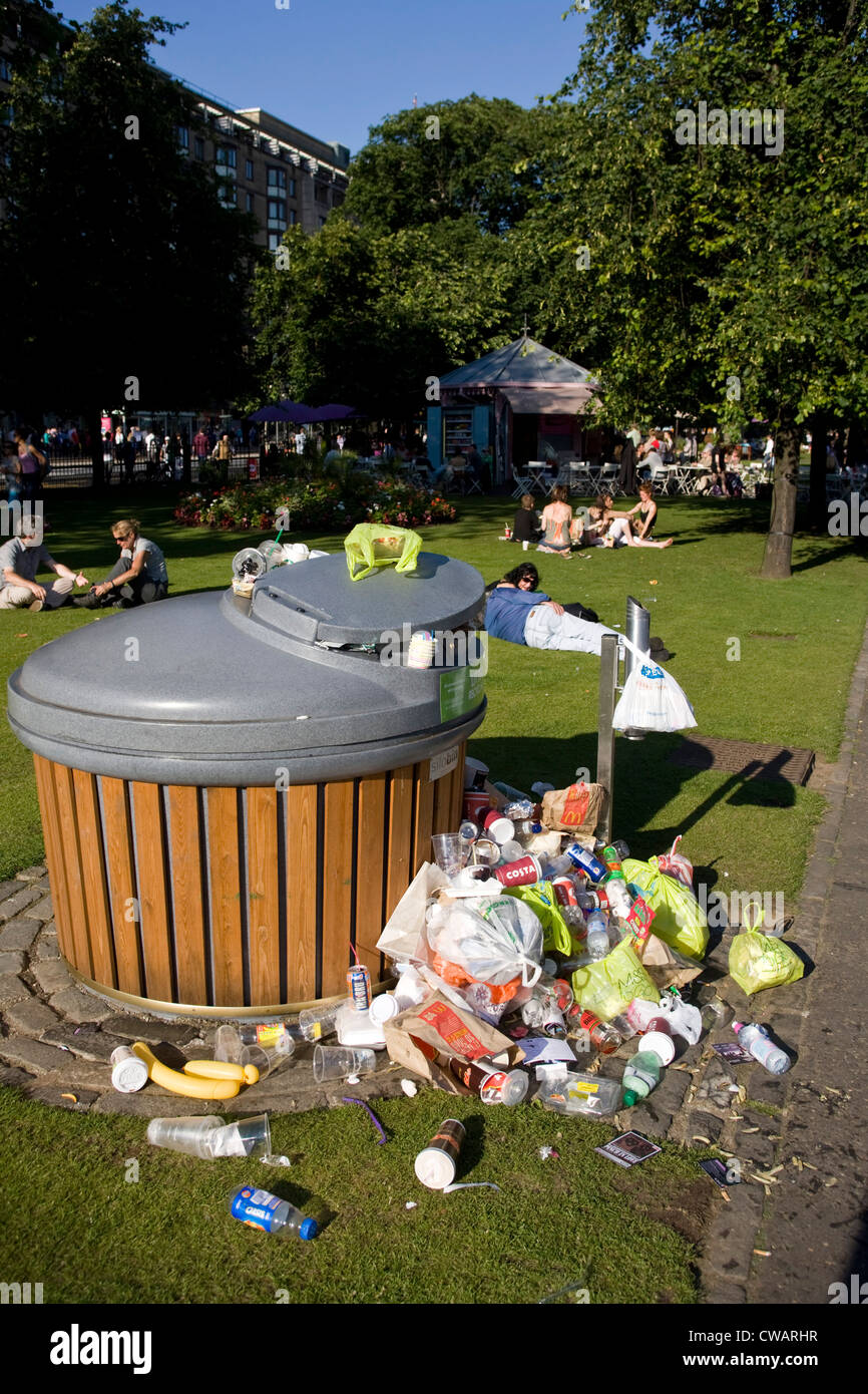 Overflowing rubbish bin in Princess Gardens Edinburgh Stock Photo Alamy