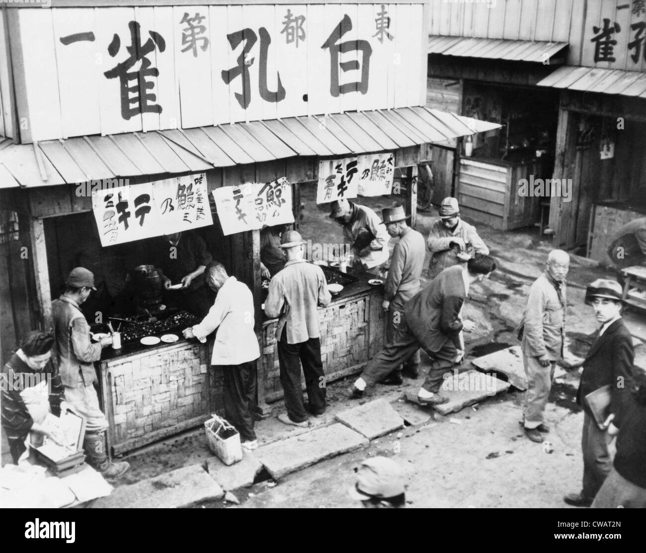 Food stall in post-World War II Tokyo has customers, but no rice. As late as the mid-1950's, Japan's economy was still Stock Photo